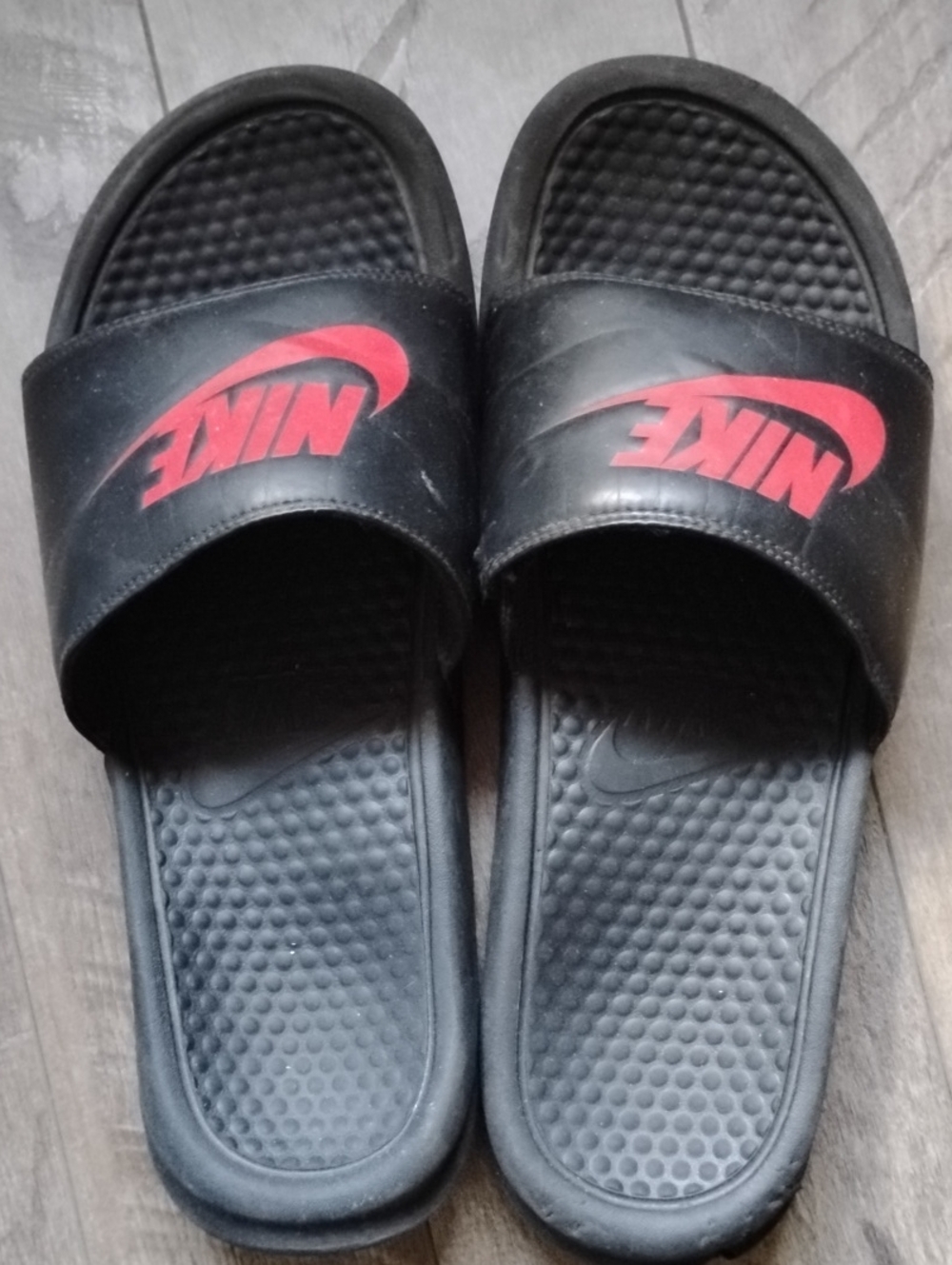 Nike Black Slide Sandals with Red Logo Accent